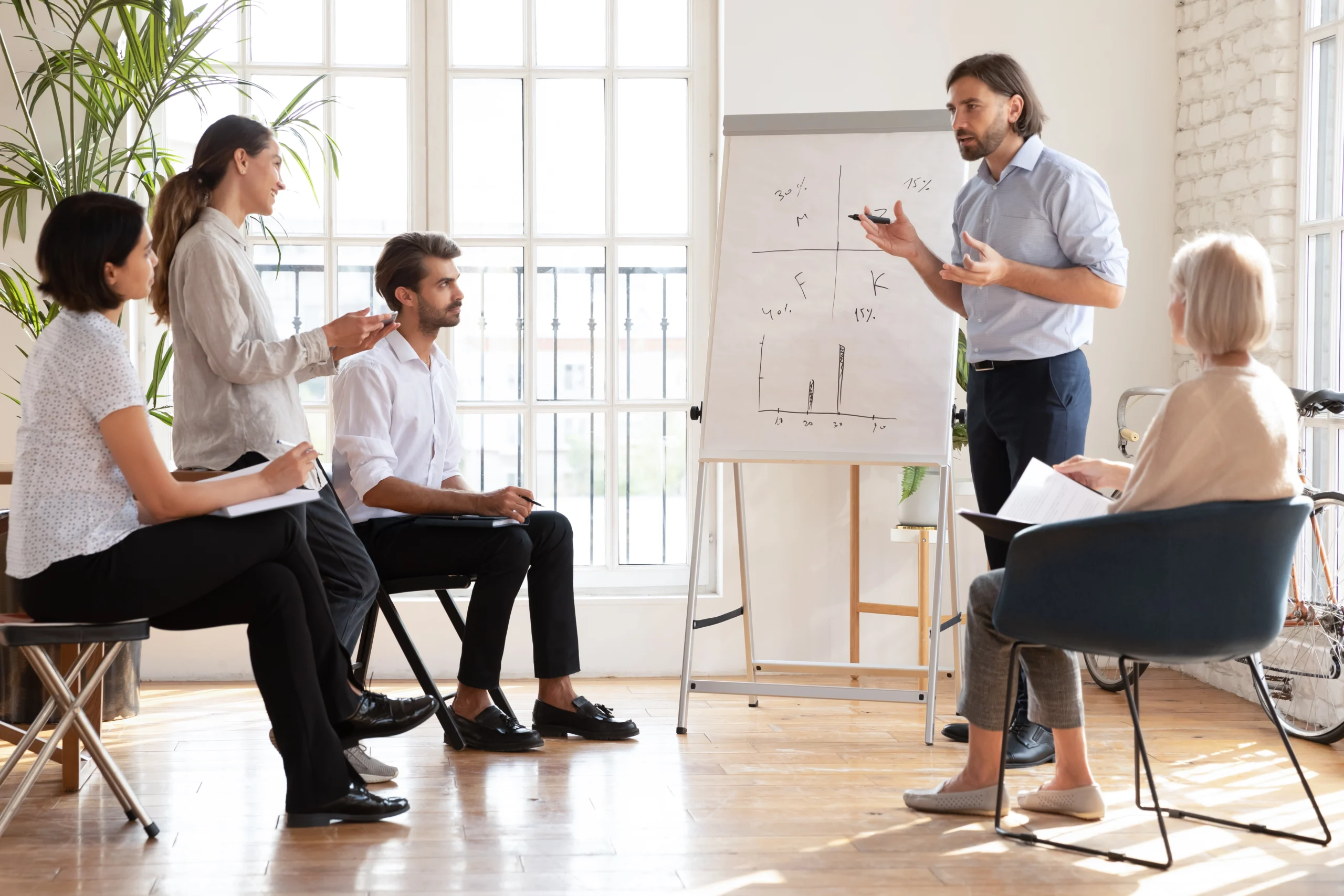 male-ceo-speak-multiethnic-staff-presenting-new-corporate-strategy